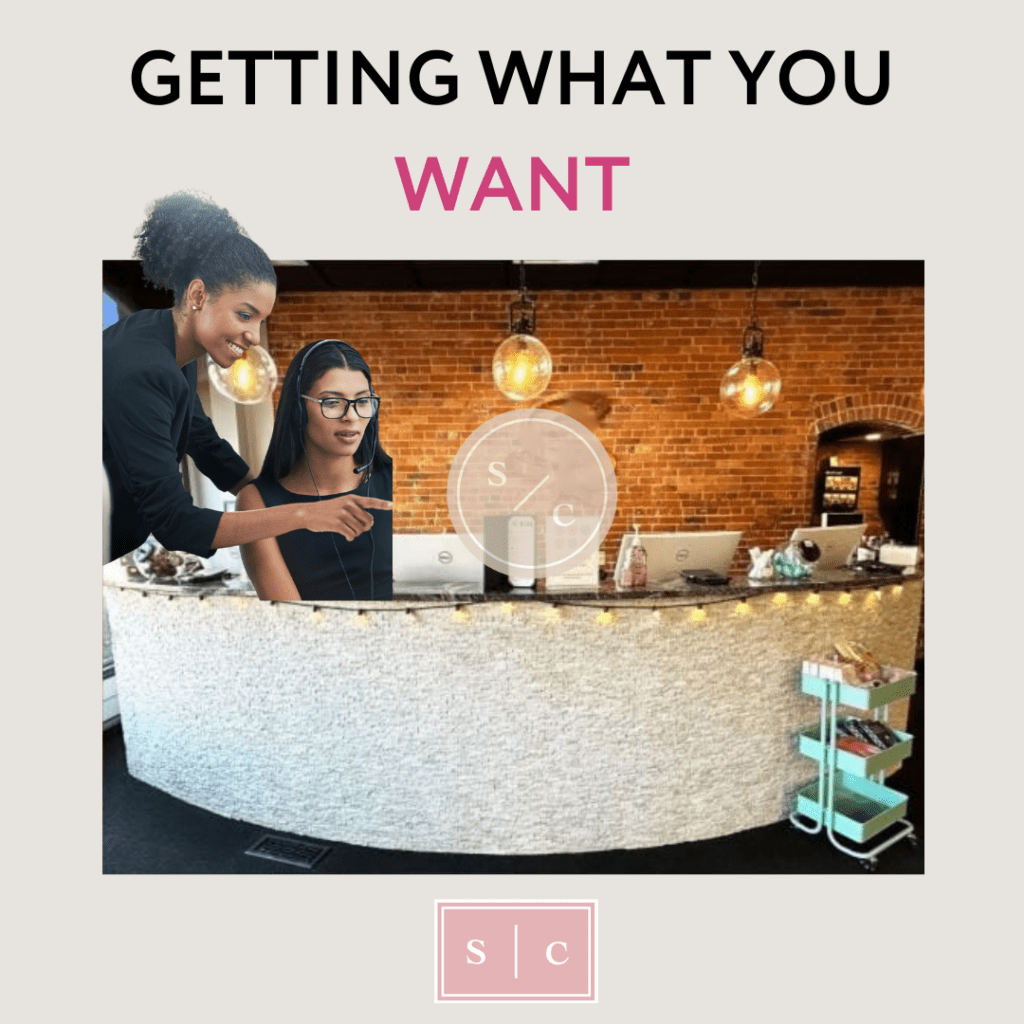 photo of a salon employee helping a salon owner who has bought the business
